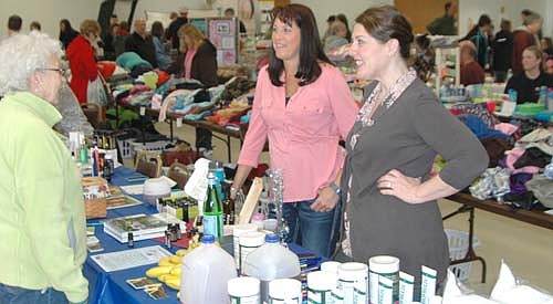 Hundreds of local and area residents attended the Stewartville Area Chamber of Commerce's Spring into Summer Marketfest at the Stewartville Civic Center on Saturday, March 28. Here, shoppers selected from items at a wide variety of businesses.