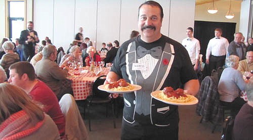 Pat Sobotta and many other authentic "Italian" waiters served more than 500 guests at the Mama Tranchita Dinner at Riverview Greens on Tuesday, March 24. The dinner, hosted by the St. Bernard's Catholic Church Men's Club, is held to raise money for church projects.
