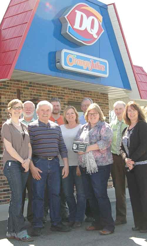 The Stewartville Area Chamber of Commerce welcomed Dairy Queen to the local business community with an official ambassador visit last week. Jeff Bagniewski, owner of Dairy Queen, third from left, accepts a Chamber plaque from Gwen Ravenhorst, Chamber administrator. Others include, from left, Melissa Sue Leuning, Chamber president; Rick Dahl, Ryan Ravenhorst, Paulette Teigen, John Senjem, Andy Mai and Bridget Dahle.