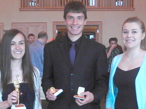 Many students received awards at the annual Stewartville High School Band Awards Ceremony at Riverview Greens on Sunday, May 3. From left are Danika Dahle, Most Valuable Player;  Nathan Abbott, Louis Armstrong Jazz Award and the John Philip Sousa Award; and Shannon Onsgard, Semper Fidelis Award.