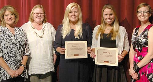 Cassandra Drees, center, and Amanda Jaeger, second from right, seniors at Stewartville High School, were each recognized as a winner of a $500 scholarship from the Stewartville Area Chamber of Commerce at the Chamber's Senior Appreciation Banquet last week. Chamber representatives include, form left, Stacy Schimmel, Gwen Ravenhorst, Chamber administrator; and Melissa Sue Leuning, Chamber president.