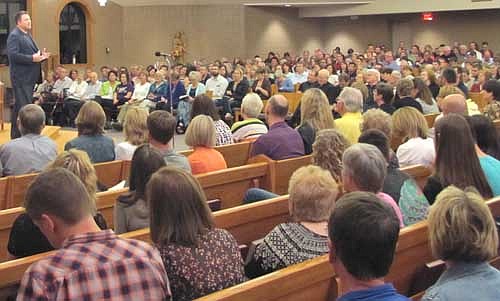 About 700 residents from Stewartville and across the area crowded into St. Bernard's Catholic Church to listen to Matthew Kelly on Saturday evening, May 16.