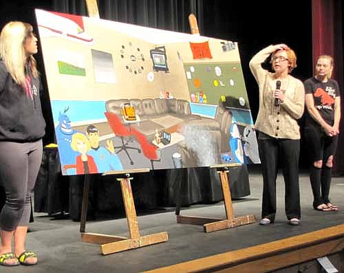 Members of the Stewartville High School class of 2015 unveiled the senior mural at the annual Academic Awards Assembly at the Performing Arts Center on Friday, May 1. The mural includes images that will remind this year's graduates of what happened  locally and around the world the year they graduated from SHS.