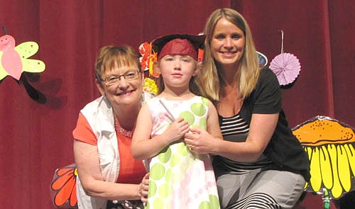 Young children received their diplomas at the annual School Readiness Spring Program and Graduation at the Stewartville High School Performing Arts Center on Wednesday, May 27. Above, graduate Jessica Eden poses with Nancy Pedersen, School Readiness teacher, left; and Sara Ellerbusch, School Readiness coordinator and teacher.