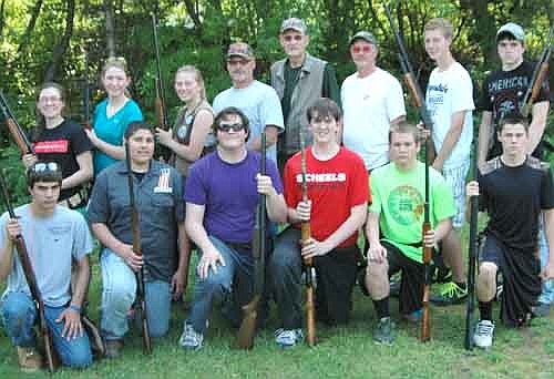 Members of the Stewartville High School Trap Team, the school's first ever, include, front row, from left, Tyler Williams, Christian Riester, Philip McCollough, Daniel McCollough, Nick Bain and Brayden Rindels. Back row, from left, Amelia Welter, Makayla Morgan, Savanah Horstmann, Tom Lofgren, assistant coach; John Russell, head coach; Ronn Carlson, assistant coach; Mitch McGuire and Mitch Osterhus.