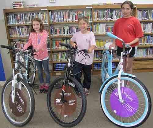 Three Central Intermediate School students have won bicycles courtesy of the Stewartville Masonic Lodge and the Olmsted County Deputy Sheriffs Association. The students, who received the bicycles on Monday, June 1 include, from left, Hiley Lauer, a fourth grader; William Onstad, a third grader; and Maddy Urban, a fifth grader. To be eligible to win a bicycle, a student must read at least one book, then enter his or her name for each book read in a drawing held each December and May. 
