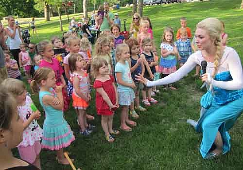 Elsa from the movie Frozen was a special guest when Stewartville Early Childhood Family Education (SECFE), celebrated 40 years of Early Childhood Family Education (ECFE) programming in Minnesota with a family picnic at Florence Park on Thursday, May 28.  In 1974, the Minnesota Legislature funded six pilot ECFE programs. Today, ECFE&#8200;serves thousands of parents and their children ages birth to 5 across the state each year.