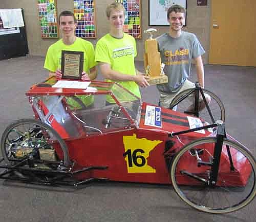 A WINNING TEAM -- From left, Jared Trisko, Jacob West and Sam VandeLoo display the awards they won for placing third among 13 cars in the electric class at the Supermileage Challenge in Brainerd this past May. "Our car was very well-built," Trisko said. "It had a couple of minor issues, but we were able to fix it."