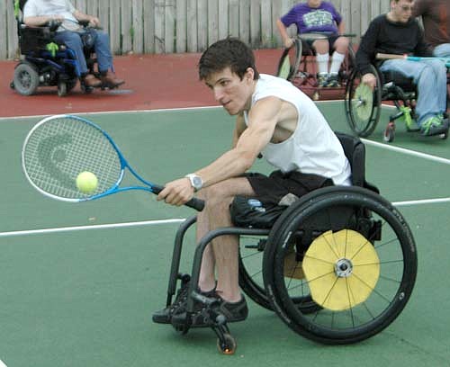 Trent Dubberke of Marshalltown, Iowa displays good form on his backhand during a tennis drill at the National Wheelchair Sports Camp at Ironwood Springs Christian Ranch last week.