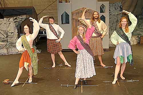 Actors and actresses perform a wedding dance with a Scottish twist during a dress rehearsal for Stewartville Community Theatre's Brigadoon, to be presented at the Stewartville High School Performing Arts Center this Friday, Aug. 7 and Saturday, Aug. 8 at 7:30 p.m. each evening; Friday, Aug. 14 and Saturday, Aug. 15 at 7:30 p.m. each evening, and Sunday, Aug. 16 at 2 p.m. Dancers include, from left, Maggie (Izzy Kramlinger), Harry (Nathan Lange), Jean (Kallie Quinn), Charley (Dave Stepan) and and Anne (Bobbie Hart).