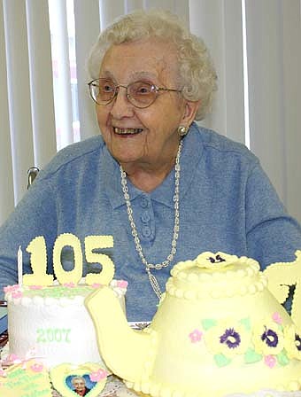 Ruth Andreasen smiles at her 105th birthday party at the Stewartville Care Center. 