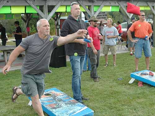 Kris Speltz of Minnesota City displays his tossing form during the beanbag tournament at the 92nd annual High Forest Old Settlers Day celebration on Saturday, Sept. 12.