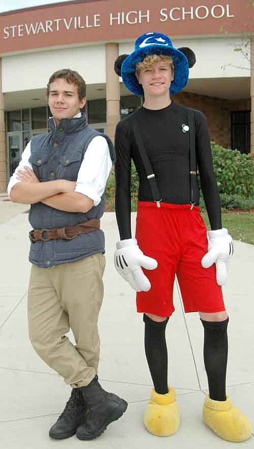 Cody Mason, a sophomore at Stewartville High School, right, dressed as Mickey Mouse to win the Wednesday, Sept. 23 Disney Day Costume Contest for SHS's 2015 homecoming. Austen Hover, a junior, left, dressed as Flynn Rider from the movie "Tangled." "Night at the Movies" was the theme of this year's homecoming.