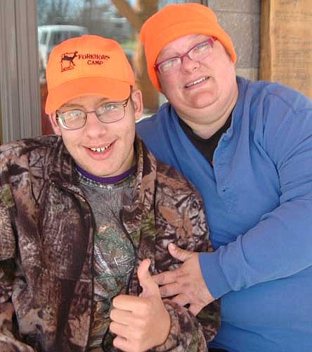 Isaiah Becker, 16, a junior at Mankato West High School, hunted deer for the first time in a hunt sponsored by the Special Youth Challenge of Southeast Minnesota on Saturday, Oct. 17. Angie Becker, Isaiah's mother, is at right.