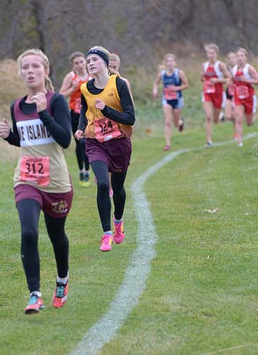 Kailee Malone (#124) placed 10th overall at sections and missed qualifying for state by just two seconds.	