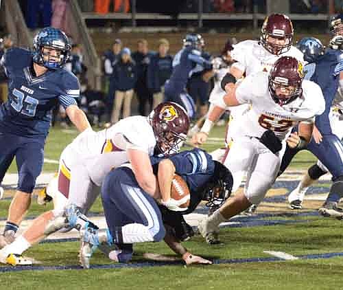 D-lineman Dawson Grotjohn  wraps up the Becker running back on this tackle-for-loss.