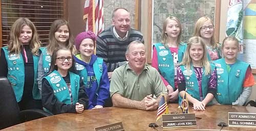 The fourth grade Junior Girl Scout Troop 44576, met with Mayor Jimmie-John King and City Administrator Bill Schimmel to complete their City Government Badge. Part of receiving the badge included learning about city government and how it works. Each girl had to come up with a question for the Mayor and City Administrator. They received a tour of the Stewartville City Hall along with some important city history. Back from left, Amelia Griffin, Lexie Walton, Bill Schimmel, Kaylee Warren, and Alyvia Zincke. Front from left, Makyah Thompson, McKenna O'Neill, Mayor Jimmie-John King, Mercedes Wellik and Cora Sieler. 
