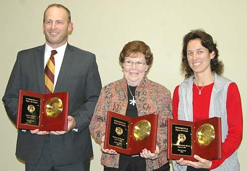 Three individuals and one team were inducted into the Stewartville Athletic Hall of Fame at a banquet at the Stewartville American Legion Post 164 on Saturday, Nov. 21. From left are inductee Chad Nelson, Charlene Kukuzke, widow of inductee Stanley Kukuzke; and inductee Dawn Miller. The 1977 SHS football team was also inducted.