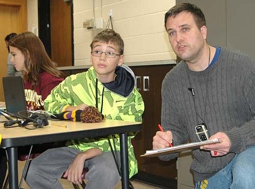 Stewartville Middle School is among 20 semifinalists from across the country in the running to receive a grant worth up to $100,000 in the Northrop Grumman Foundation Fab School Labs Contest. Stewartville and the other semifinalists, chosen from among about 200 applicants, have posted online videos about their curriculums to enhance students' interest in science, technology, engineering and mathematics. Kelly Schrandt, right, teaches the newly required STEAM (Science, Technology, Engineering, Art and Math) curriculum at the Middle School. Above, Schrandt works with seventh grader Kyler Payne.  Mya Wangen, another seventh grader, is at left.