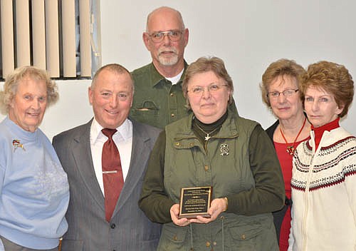 Mayor Jimmie-John King, second from left, presented the 2015 Mayor's Award for Community Service to the Stewartville Area Historical Society at the city's annual awards and recognition event at the Civic Center on Wednesday evening, Dec. 16. Historical Society Board of Trustees members who attended the event include, from left, Elaine Eggler, Buck Fredricksen, treasurer; Vicki Meredith, president; Ardis Copple and Myrna Wesselman, historian.