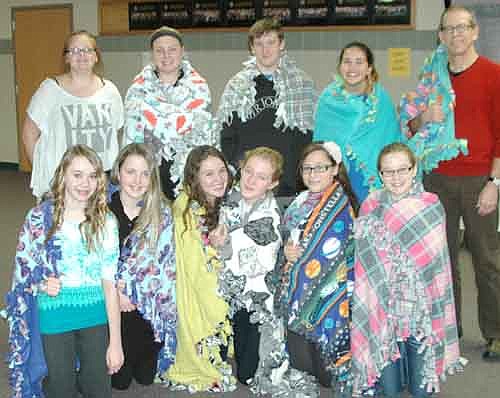 Builders Club members who tied blankets include, front row, from left, Grace Kittelson, Baylee Edwards, Maya Ramp, Isabel Field, Olyvia Heaser and Makayla Kennedy. Back row, from left, Bailee Bartel, Mya Sistad, Stafford Handlang, Miranda Anderson and Craig Bell, advisor.
