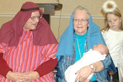 Gary Boyum, left, played Joseph, Charlotte Kath was the Blessed Virgin Mary and 5-week-old Cas Roeder was the Baby Jesus as the Stewartville Care Center presented its live Nativity on Thursday, Dec. 24. The Stewartville STAR will present a full feature story on "Christmas at the Care Center" in its Tuesday, Jan. 5 issue.