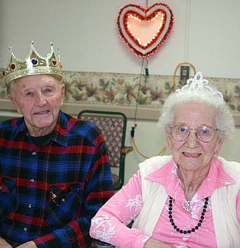 THE KING AND QUEEN -- Ernie Klomps and Alta Morris were elected Valentine's Day king and queen at the Stewartville Care Center last week. La Vaine and Harriet Parsons were the runners-up. Other candidates included Frances Madsen, Warren Frie, Helen Scheer, Don Johnston and Don Stilwell. 