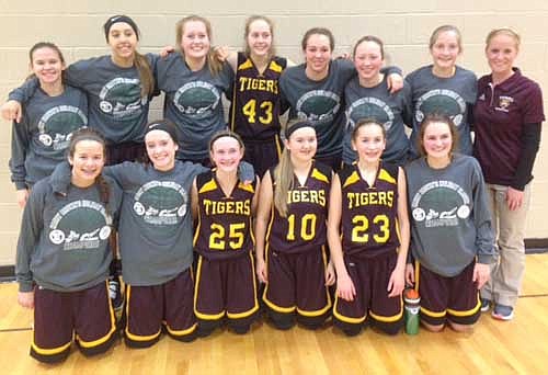 The Stewartville JV girls basketball team captured first place at the Harry Brown's Holiday Classic Tournament in Faribault on Dec. 29-30. The Tigers crushed Faribault 63-47 in the opener and took care of the ball, winning 37-29 over WEM in the championship game. Team members are, kneeling, from left, Amy Lofgren, Abby Vandewalker, Kailee Malone, Jenny Stageberg, Lilly Welch, Maddie Lee. Standing, from left, Jordan Schindler, Kaitlyn Prondzinski, Emma Welch, Janessa Malone, Kenna Theobald, Bailey Henderson, Jada Hale, Coach Felten.