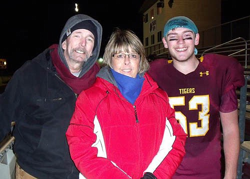 Dave "Bip" Graves, left, poses with his wife Becky and son Dillon after a recent Stewartville High School football game. Bip battled cancer for about 3 1/2 years before passing away on Tuesday, Jan. 5. The Stewartville Morning Lions Club will host a benefit for the Graves family at the Riverview Greens Clubhouse this Saturday, Jan. 16 beginning at 4 p.m.