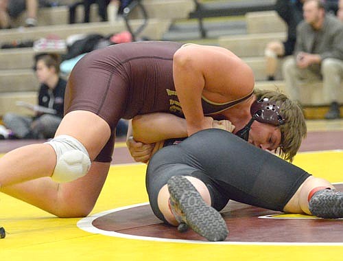 Adam Gehling executes an arm bar to turn his 220-pound JM opponent.