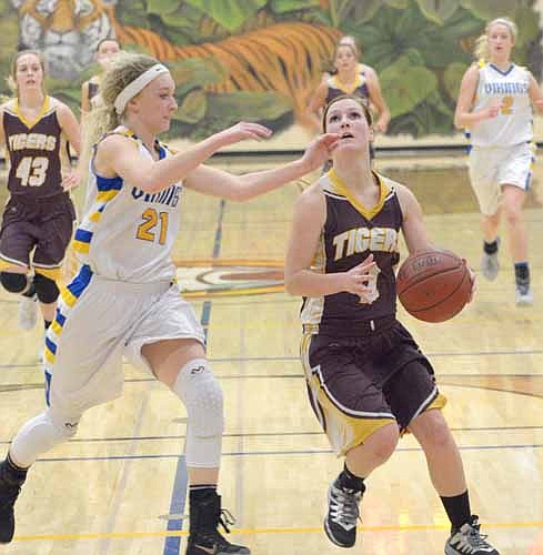 Kyleigh Wangen eyes the hoop for a layup against Hayfield.