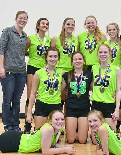 The Stewie 15 Blue JO volleyball team captured first place at the NVC 16's tournament on Jan 9. Team members are, in front, Chrystal  Mullenbach (left) and Mackenzie Walters. Kneeling, from left, Madison Inglet, Jordan Schindler, Cecilia Griffin. Standing, from left, Coach Jenna  Willenborg, Paige Lehman, Teagan Tonjum, Brianna Blohm, Shae Thomas.
