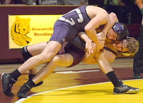 Tanner Prochaska executes a cradle from the neutral position and uses his weight to drop his opponent to the mat before collecting back points.