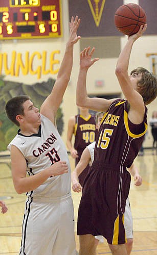 Andrew Quandt gets up and over on this fall-away jumper.