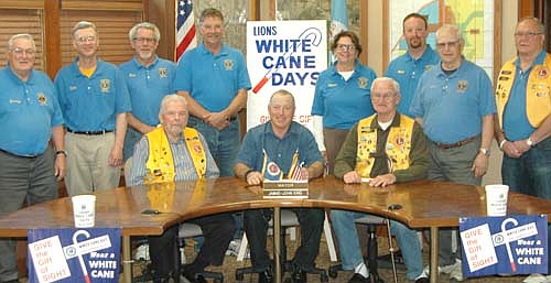 The Stewartville Lions Club will raise money to fight blindness and other eye diseases with its annual White Cane Days this Friday, April 29. About 25 Lions Club members will accept donations at the two Kwik Trip stores, the two Casey's stores, Fareway and C&F Video that day. Several of the Lions who will volunteer their time include, front row, from left, George Menshik, chair of White Cane Days; Mayor Jimmie-John King, who signed a proclamation declaring April 29 White Cane Days in Stewartville; and Darrel Jaeger. Back row, from left, Gordy Koehn, Byron Meline, Bob Fauver, Lee Boettcher, Sharon Morlock, Mike Rainey, Francis Weber and Dick Uptagrafft.