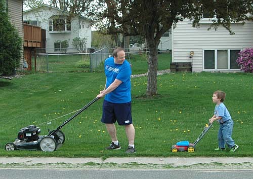 When John Omacht of Stewartville decided to mow his lawn on&#8200;Monday, April 25, his son Chase, 4, wanted to help. Omacht, who lives at the 800 block of Fifth Avenue Southeast, says Chase loves to push his toy mower in his dad's footsteps. "He likes it," Omacht said of his son. "He says, 'Let's mow the lawn!' "