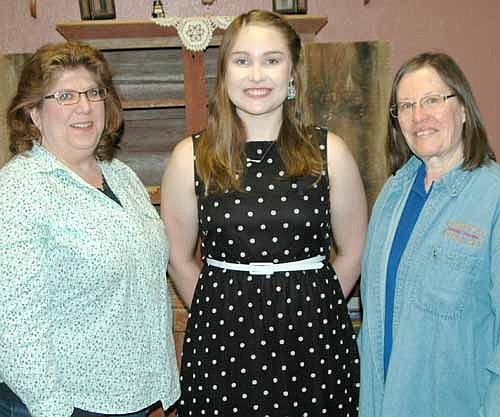 Diana Humble, a senior at Stewartville High School, center, has earned a $350 scholarship from the Stewartville Kiwanis Club. Lori Torgerson, left, and Barb Howes, right, congratulated Humble at a breakfast hosted by the Kiwanis Club last week.