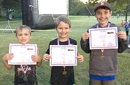 First-place winners in the Summerfest Kids Decathlon, held at Florence Park on Sunday, July 3, included, from left, Simon Emmanuel, ages 6-7; Cole Cropp, ages 8-9; and Brady Pickett, ages 10-13.