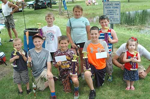 FISHING WINNERS -- Winners in the Summerfest Fishing Contest include, front row, from left, Ike Hengel, 3, third place, 0-6 age group; Braeden Erickson, 10, last fish caught; Hunter Karnitz, 10, first place, ages 7-11; Aidan Jahns, 11, second place, ages 7-11; and Amelia Gwilt, 2, second place, ages 0-6. Back row, from left, Nolan Light, 8, third place, ages 7-11; Taylor Peterson, 9, first fish caught; and an unidentified participant. Kyle Webb, who finished first in the 12-14 age group, is not pictured.