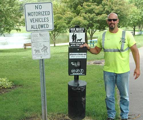 Eric Domino of the city of Stewartville's public works department recently installed the new dog waste station near the Florence Park Pond. For the most part, local residents do a good job cleaning up after their pets, Domino said.