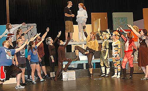 "CATS" WILL DEBUT THIS FRIDAY -- Old Deuteronomy (Gary Kadansky) standing top left, explains to Victoria (Bobbie Hart) what its like to "Ascend to the Heavy-side Layer" as the cast looks on during a dress rehearsal for the Stewartville Community Education Theatre production of "Cats."