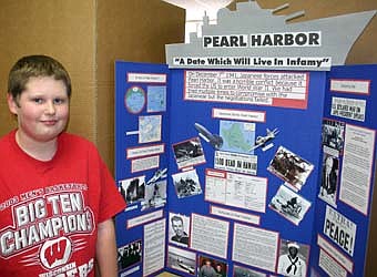 Justin McHenry, a seventh-grader at Stewartville Middle School, completed a History Day project titled "Pearl Harbor: A Date Which Will Live in Infamy."  
