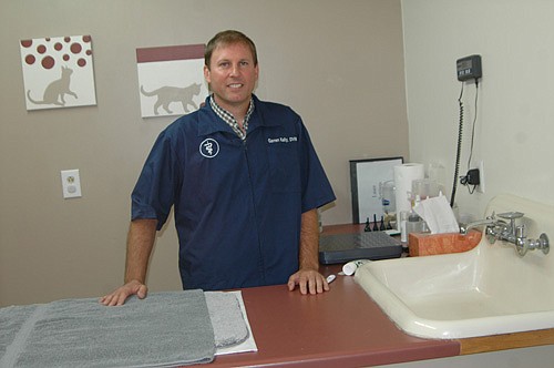 Dr. Garren Kelly, above, recently purchased the Stewartville Animal Clinic from Dr. George Sedgwick, who had owned the clinic since 1970.