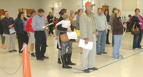 Local residents waited in long lines to cast ballots at the Stewartville Civic Center on Tuesday, Nov. 8. Cheryl Roeder, city clerk, said a total of 3,203 residents voted. "It was one of the highest turnouts we've had," she said.