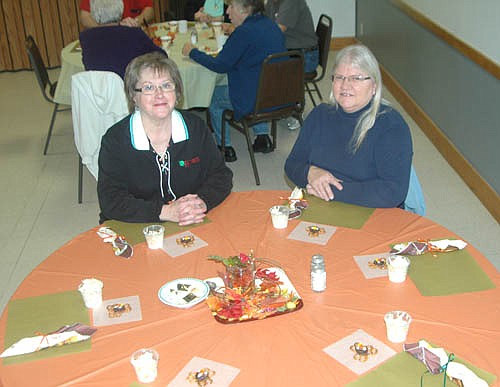 Sharon Theobald, left, and Judy Bunde were among the many residents who attended a Thanksgiving-style lunch at the Center for Active Adults on Tuesday, Nov. 15.