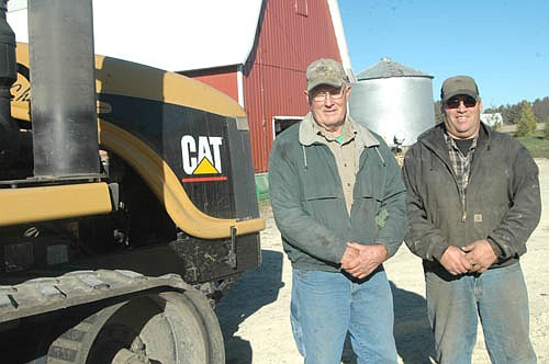 Frank Twohey, left, and his son Ed, who grow 620 acres of corn and 325 acres of soybeans on their farm just west of Stewartville, are grateful for an excellent harvest for 2016. The Twoheys say that in their many years of farming, they've rarely seen a harvest as good as this year's. "We had the best bean yield by far, and the corn is right up there with one of our best crops," Ed said. See story at right.