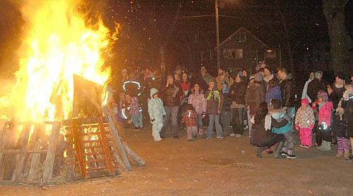Stewartville and area residents who attended the annual Winterfest celebration on Saturday, Dec. 3 enjoyed warming themselves near a bonfire at Florence Park.