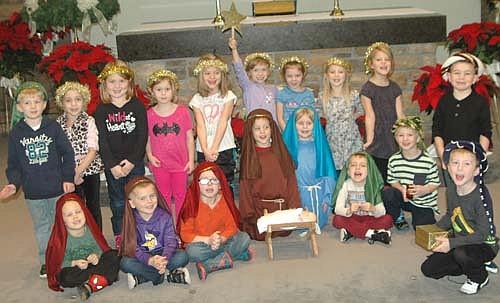 All decked out as shepherds, angels and Wise Men, the Wee Care children at St. John's Lutheran Church practiced for their annual Christmas program on Wednesday, Dec. 7, then presented the program on Saturday, Dec. 10.