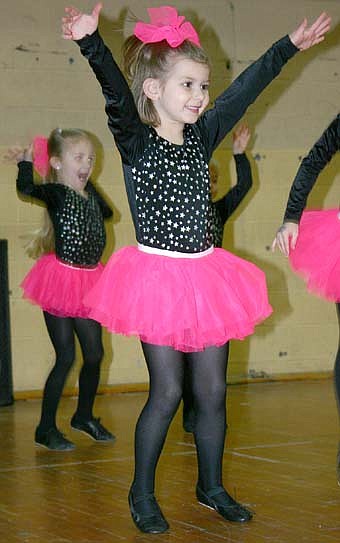 Just For Kix dancer Kendall Clausen danced the Bunny Hop at the Stewartville Chamber Home Show. 