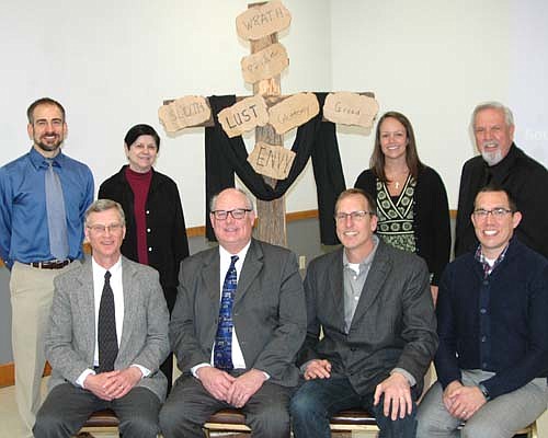 "The Seven Deadly Sins" was the theme as the Stewartville Ministerium hosted the annual Ecumenical Good Friday service at the Stewartville Civic Center on Friday, April 14. Participating ministers spoke of lust, envy, greed, sloth, wrath, pride and gluttony, then nailed each sin to Jesus's cross. Speakers included, front row, from left, Byron Meline, Zion Lutheran Church; Wane Souhrada, Stewartville United Methodist Church; Paul Langmade, Grace Evangelical Free Church and Lance Lorenz, Pleasant Grove Church of Christ. Back row, from left, Chad Skaran, Redemption Hill Church; Becky Hoot, Stewartville Christian Church; Catie Levenick, Stewartville United Methodist Church; and Dave Hoot, Stewartville Christian Church.
